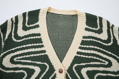 Unisex oversized cardigan i strik med abstrakt hvirvelmønster